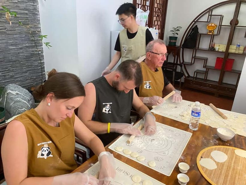 Beijing: Dumpling Making Workshop with Meal and Tea - Tea, beer, and the shared table