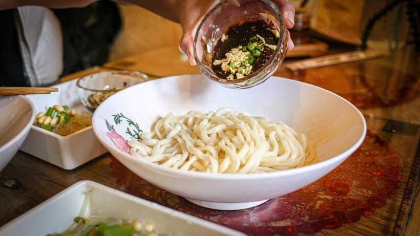 Beijing: Hidden Gems Guided Food Tour with Beer and Tastings - Spring pancakes and family tradition