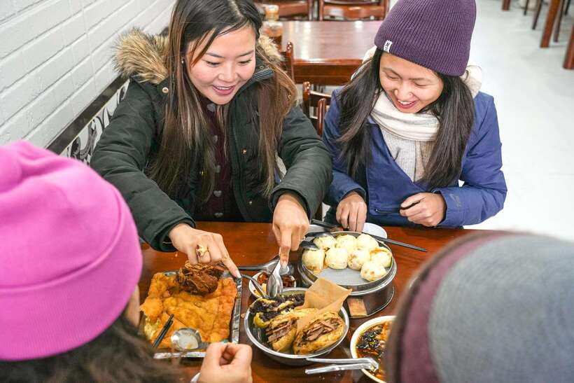 Beijing: Hutong Breakfast Food Tour - Mr. Yu’s beef flatbread and tofu pudding