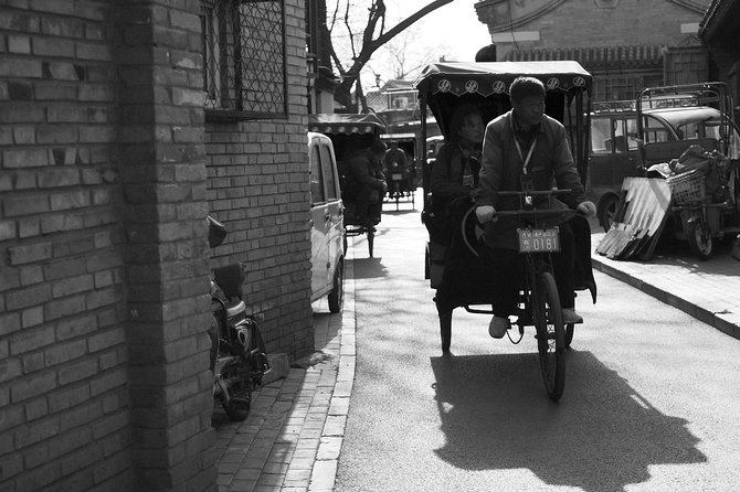 Beijing Old Hutongs Tour by Rickshaw - Riding through the hutongs by rickshaw