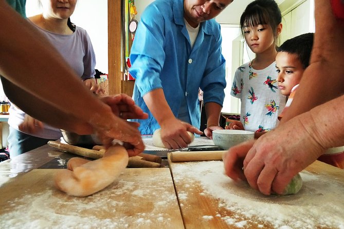 Beijing: Private Dumpling Cooking Class in Local Family - Sitting down to your DIY meal