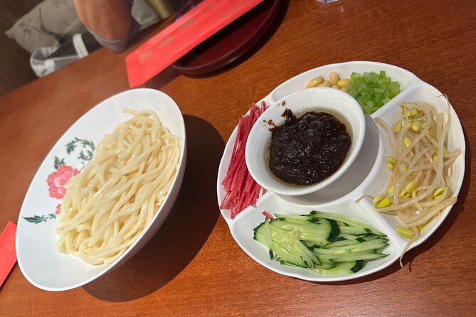 Beijing Walking Food Tour with a Local Friend - Walking through the Dongsi hutongs