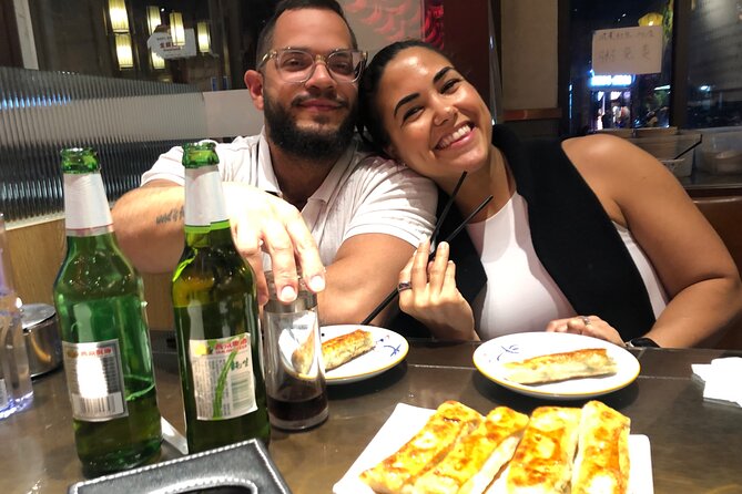 Experience Beijing Walking Food Tour Private - Beer, bottled water, and the pace of the walk