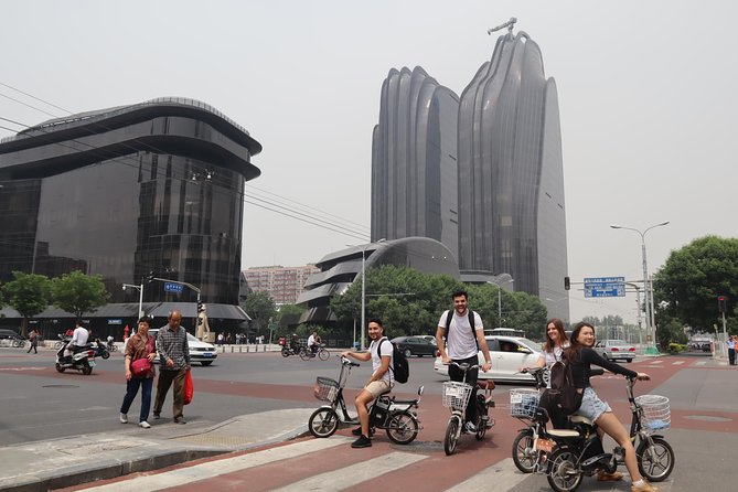 Modern Beijing Discovery by Bike - The Place and Beijing’s giant screen