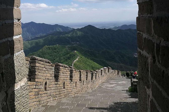 Private Half-Day Mutianyu Great Wall Tour including Round Way Cable Car or Toboggan - Reaching the wall by trail, chair lift, or cable car