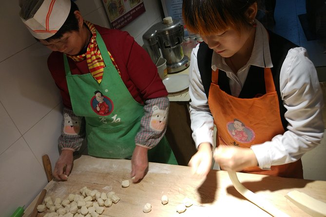 Private Hutong Culture Tour with Dumpling Cooking Class plus Cricket Fighting Game - Making dumplings in a local home